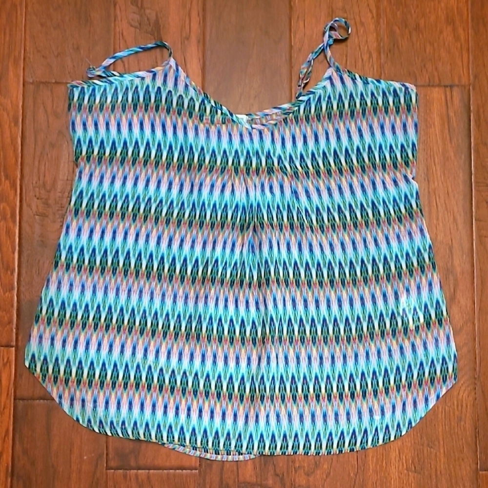 Maurices women's semi-sheer sleeveless top with a multicolor pattern size Large